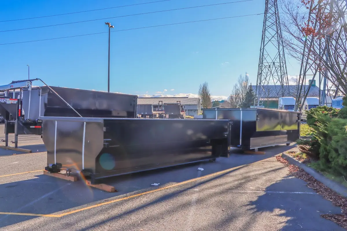 Roll-off dumpster ready for waste disposal at job site for Construction Dumpster Rental in Paradise